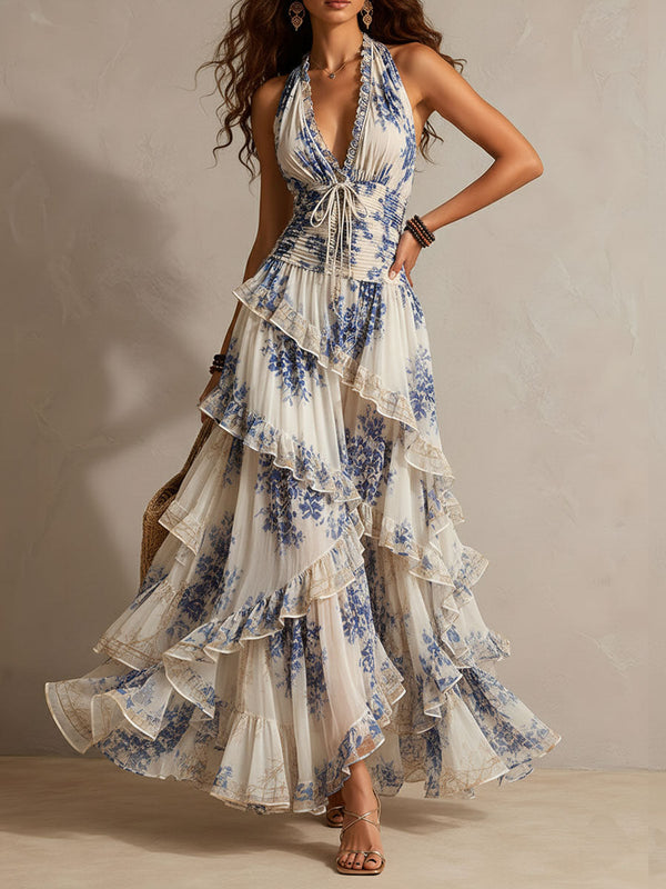 Clara - blaues Boho-Chiffon-Maxikleid mit Blumenmuster, Neckholder, Stufen und Rüschen
