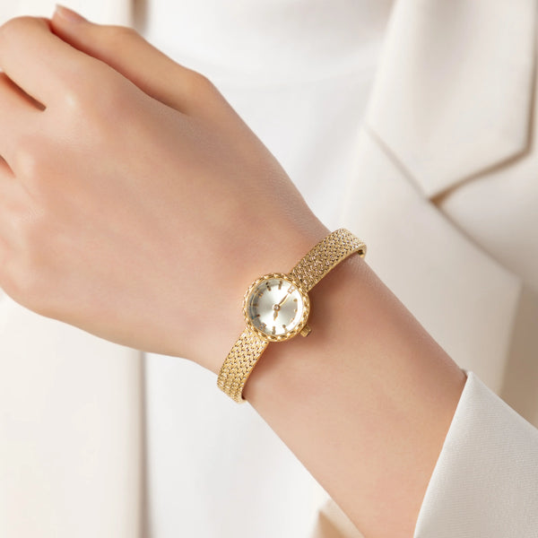 Magdalena – Goldene Uhr mit schmalem Band.