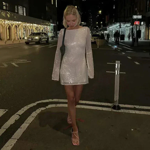 Zerynna™ - rückenfreies, glitzerndes Minikleid mit langen Ärmeln