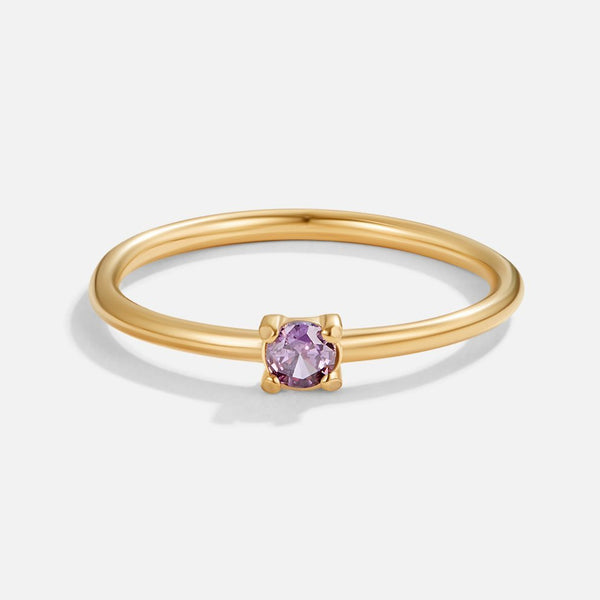 Febra – Goldring mit violettem Geburtsstein