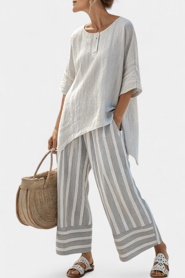 Talvora - elegante asymmetrische Bluse mit gestreifter Hose