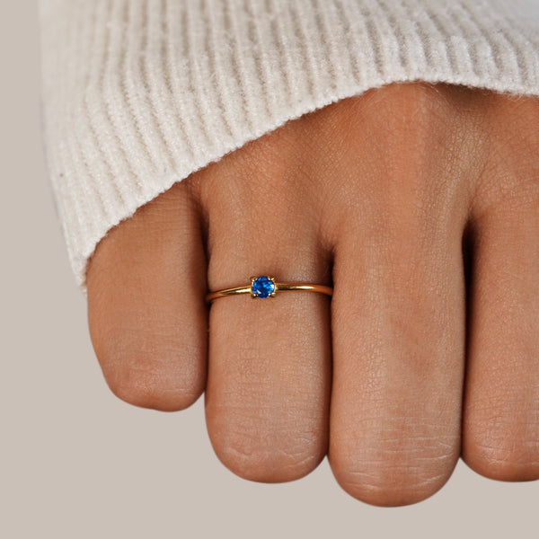 Septima – Goldring mit blauem Geburtsstein