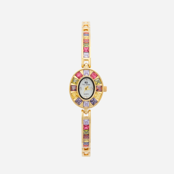 Amelie – Goldene Uhr mit Kristallrahmen.