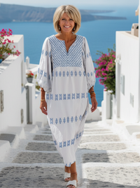 Evadne - besticktes Maxikleid mit V-Ausschnitt und langen Ärmeln