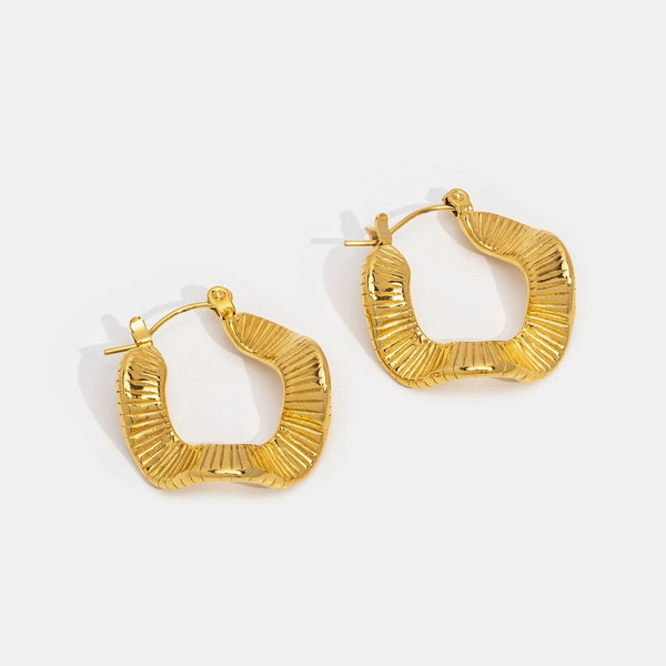 Lilou - Geometrische Wellen Gold Creolen