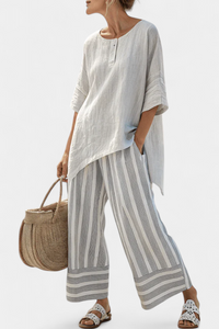Talvora - elegante asymmetrische Bluse mit gestreifter Hose
