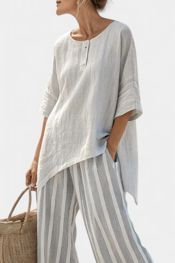 Talvora - elegante asymmetrische Bluse mit gestreifter Hose