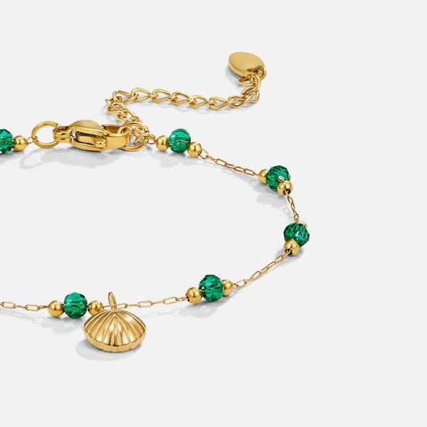 Nerissa - Armband aus goldener Muschel und grünen Perlen
