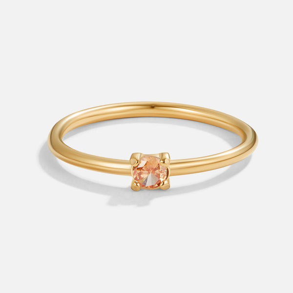 Novena – Goldring mit orangem Geburtsstein
